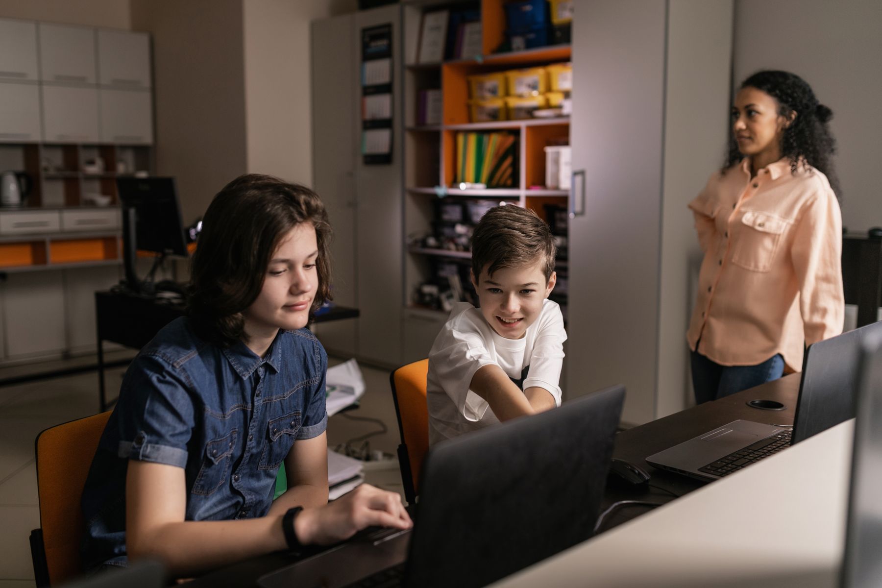 Students using computers in a technology-enabled classroom