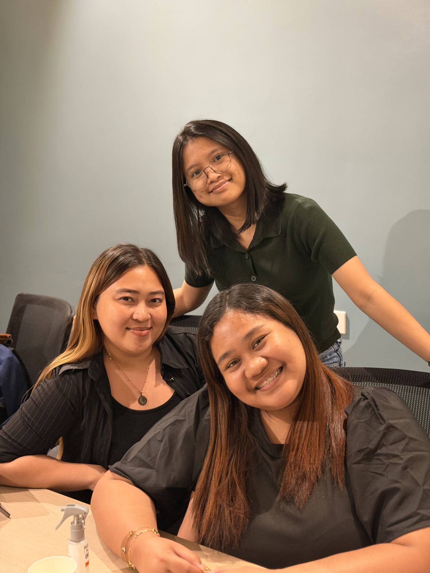 Interns sharing a light moment in the office